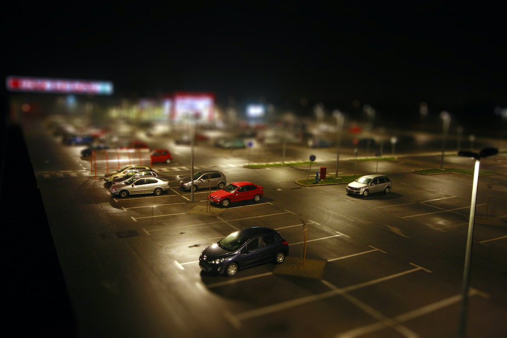 High Angle View Of Cars In Parking Lot At Night